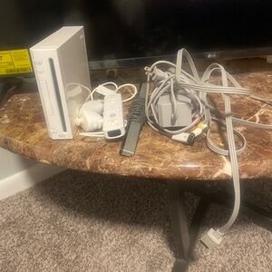 Wii console with the controller